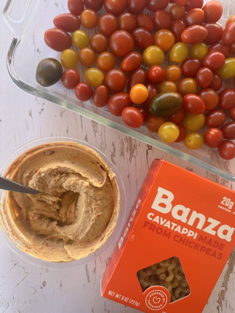 Ingredients to make this creamy, protein-packed hummus pasta with roasted tomatoes. Simple ingredients make this tasty and flavorful Hummus and Roasted Tomato Pasta.