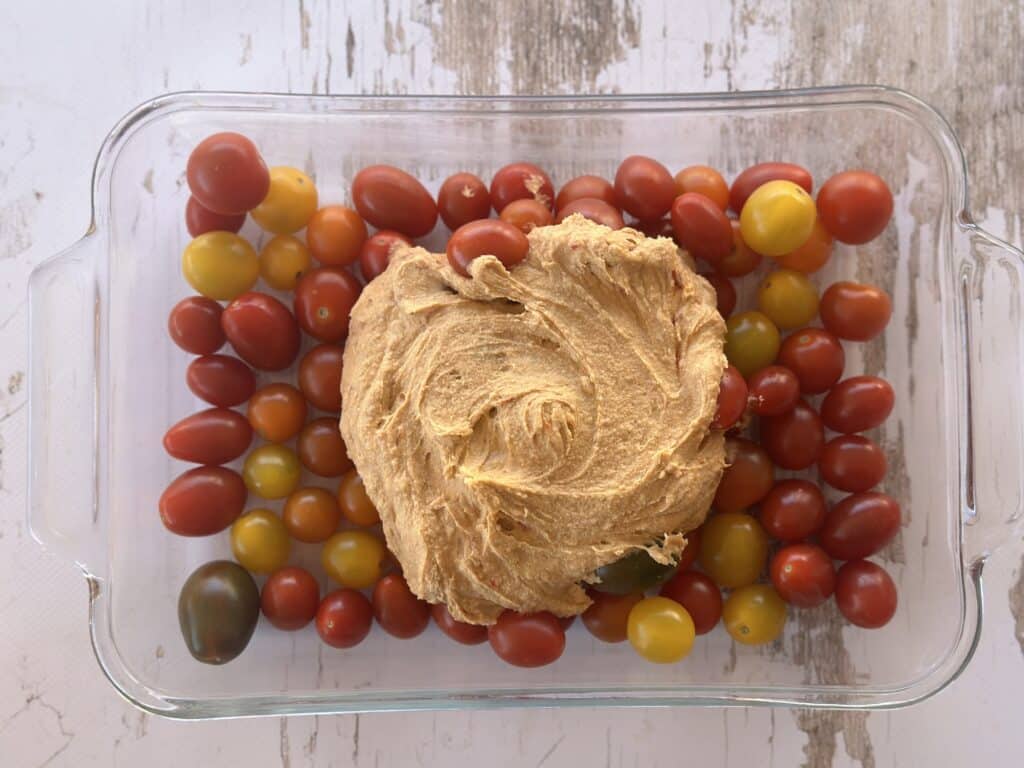 A simple and flavorful hummus and roasted tomato pasta recipe. Hummus and tomatoes make an easy sauce for pasta.